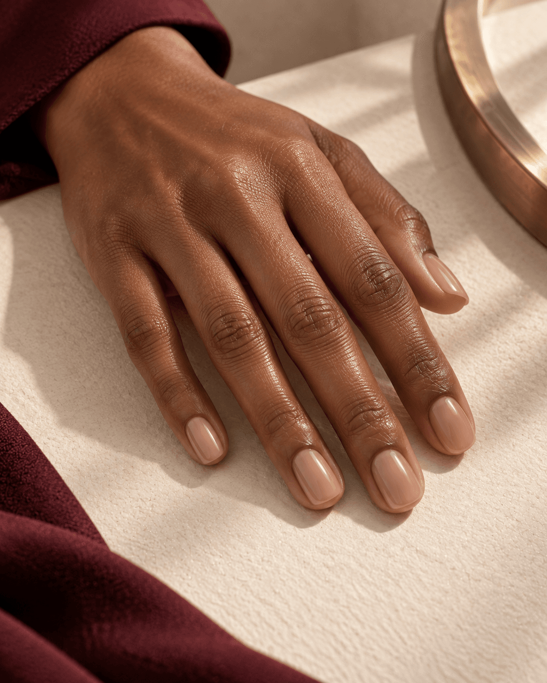 Glossy neutral manicure detail